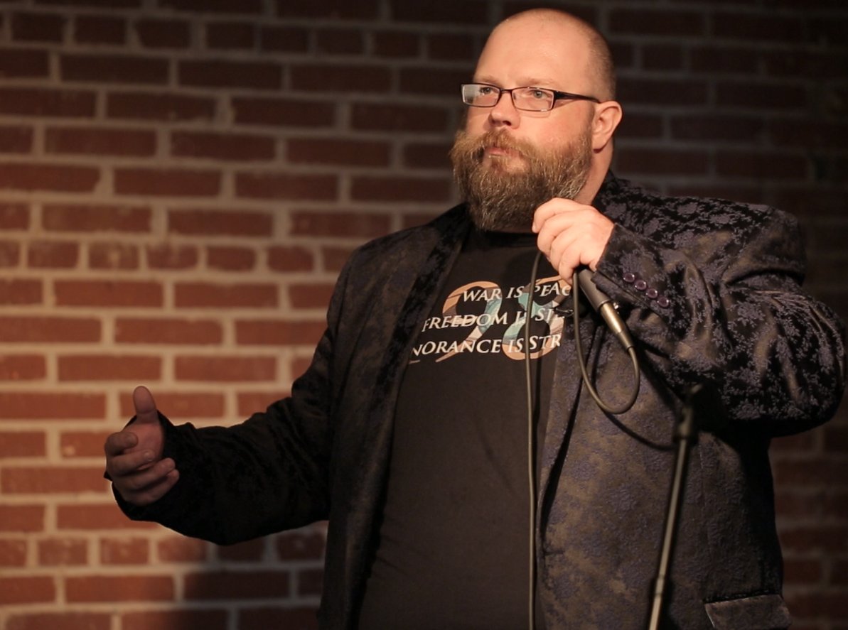 Drew speaking at an event